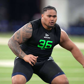 Mar 2, 2025; Indianapolis, IN, USA; Arizona offensive lineman Jonah Savaiinaea (OL36) during the 2025 NFL Scouting Combine at Lucas Oil Stadium. 