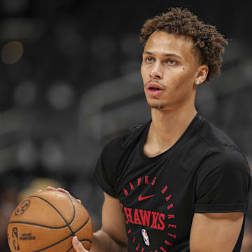 Apr 13, 2025; Atlanta, Georgia, USA; Atlanta Hawks guard Dyson Daniels (5) warms up on the court prior to the game against the Orlando Magic at State Farm Arena. Mandatory Credit: Dale Zanine-Imagn Images
