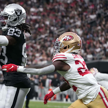 Aug 13, 2023; Paradise, Nevada, USA; Las Vegas Raiders wide receiver Kristian Wilkerson (83) catches the ball against San Francisco 49ers cornerback D'Shawn Jamison (22) in the second half at Allegiant Stadium