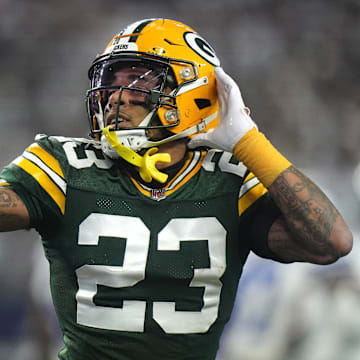 Green Bay Packers cornerback Jaire Alexander reacts after intercepting a pass during the first quarter.
