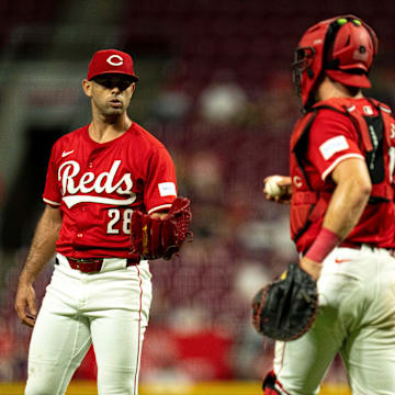 Cincinnati Reds pitcher Nick Martinez (28) receives the ball from Cincinnati Reds catcher Tyler Stephenson (37) during a timeout in the sixth inning of the MLB game between the Cincinnati Reds and Houston Astros at Great American Ball Park in Cincinnati on Wednesday, Sept. 4, 2024.