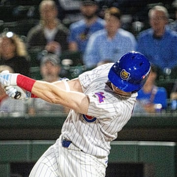 Iowa Cubs' Owen Caissie (17) swings at the ball on Friday, March 28, 2025, at Principal Park in Des Moines.