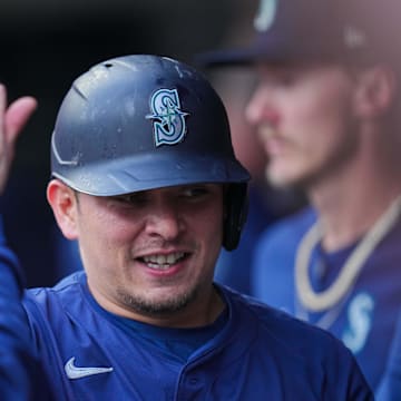 Seattle Mariners third baseman Luis Urias (16) celebrates his run against the Minnesota Twins in the second inning at Target Field on May 7.