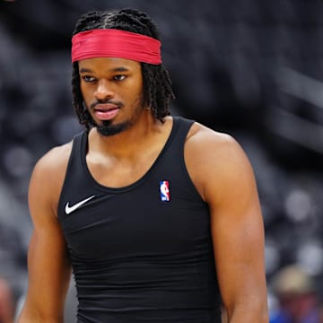 Feb 6, 2025; Denver, Colorado, USA; Denver Nuggets center DaRon Holmes II (14) warms up before a game against the Orlando Magic at Ball Arena.