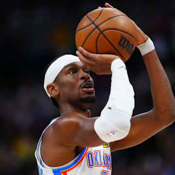 May 9, 2025; Denver, Colorado, USA; Oklahoma City Thunder guard Shai Gilgeous-Alexander (2) prepares to shoot a technical free throw in the first half against the Denver Nuggets during game three of the second round for the 2025 NBA Playoffs at Ball Arena. Mandatory Credit: Ron Chenoy-Imagn Images