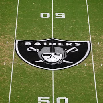 Aug 23, 2024; Paradise, Nevada, USA; The Las Vegas Raiders shield logo at midfield at Allegiant Stadium. Mandatory Credit: Kirby Lee-Imagn Images