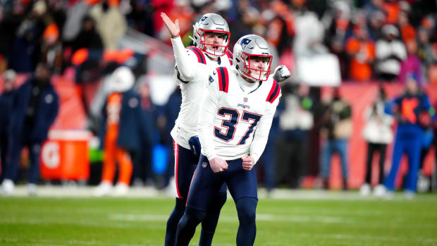 New England Patriots place kicker Chad Ryland (37) and punter Bryce Baringer (17) celebrate.