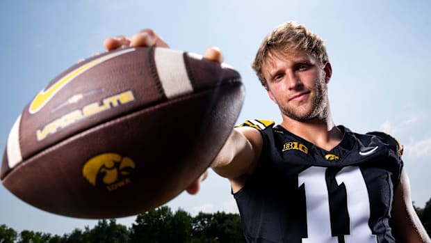 Iowa quarterback Mark Gronowski poses for a photo at Hawkeyes media day.