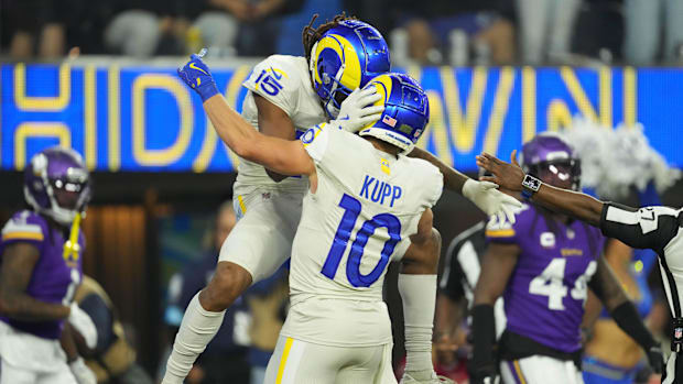Los Angeles Rams wide receiver Demarcus Robinson (15) celebrates with Cooper Kupp (10) after scoring against the Vikings.