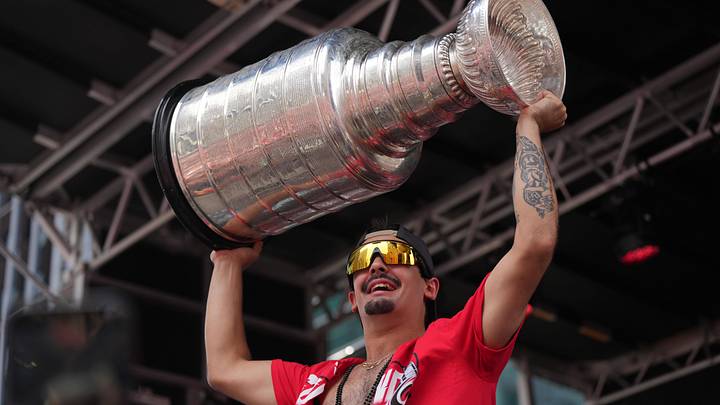Jun 20, 2026; Raleigh, North Carolina, USA; Carolina Hurricanes right wing Seth Jarvis (24) holds up the Stanley Cup Trophy during the Stanley Cup championship parade and rally at Raleigh. Mandatory Credit: James Guillory-Imagn Images