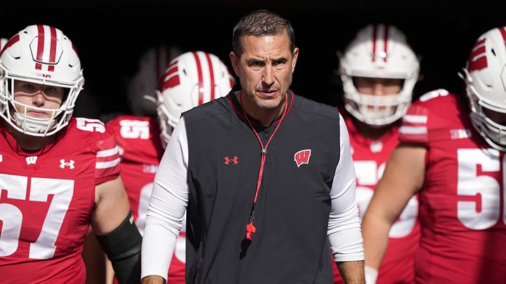 Oct 18, 2025; Madison, Wisconsin, USA;  Wisconsin Badgers head coach Luke Fickell during warmups prior to the game against the Ohio State Buckeyes at Camp Randall Stadium. Mandatory Credit: Jeff Hanisch-Imagn Images