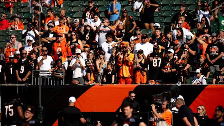 Cincinnati Bengals fan clap as Cincinnati Bengals head coach Zac Taylor speaks over the PA system during Bengals Camp practice at Paycor Stadium in Cincinnati on Aug. 2, 2025.