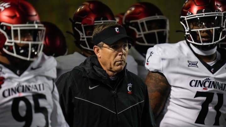 Cincinnati Bearcats head coach Scott Satterfield prepares to take the field for the first quarter of the NCAA Big12 football game between the Oklahoma State Cowboys and the Cincinnati Bearcats at Boone Pickens Stadium in Stillwater, Okla., on Saturday, Oct. 28, 2023.