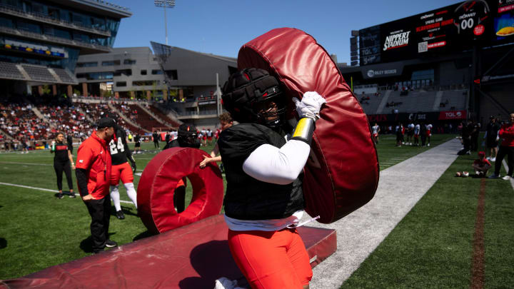 Cincinnati Bearcats defensive lineman Dontay Corleone runs a drill during the University of Cincinnati annual Red and Black Spring football game and practice at Nippert Stadium in Cincinnati on Saturday, April 13, 2024.