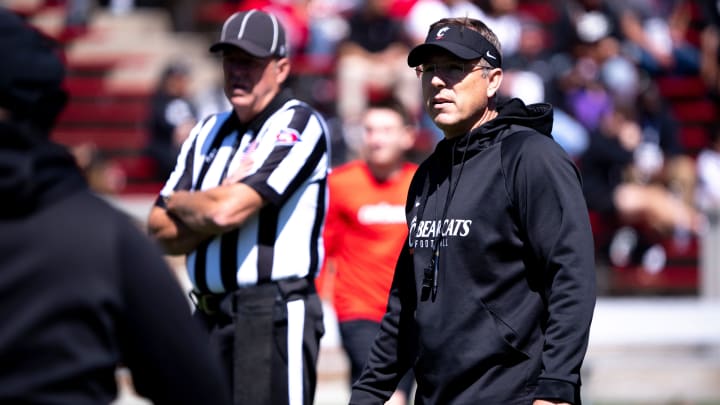 Cincinnati Bearcats head coach Scott Satterfield walks the field during the University of Cincinnati annual Red and Black Spring football game and practice at Nippert Stadium in Cincinnati on Saturday, April 13, 2024.