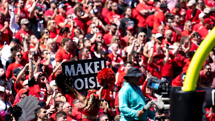 Cincinnati Bearcats cheerleader holds up a sign in the first quarter of the College Football game between the Cincinnati Bearcats and the Pittsburgh Panthers at Nippert Stadium in Cincinnati on Saturday, Sept. 7, 2024.