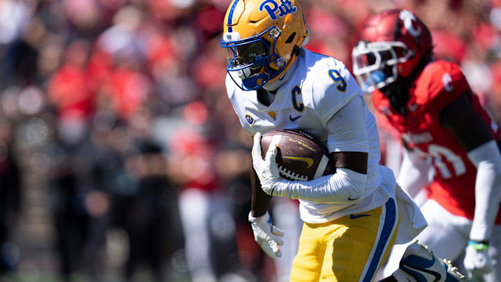 Pittsburgh Panthers wide receiver Konata Mumpfield (9) scores a touchdown in the fourth quarter of the College Football game at Nippert Stadium in Cincinnati on Saturday, Sept. 7, 2024.