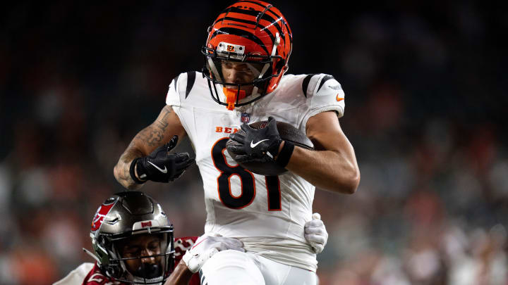 Cincinnati Bengals wide receiver Jermaine Burton (81) catches a pass for a touchdown as Tampa Bay Buccaneers corner back Zyon McCollum (27) attempts to stop him in the fourth quarter of the NFL preseason game at Paycor Stadium in Cincinnati on Saturday, August 10, 2024.