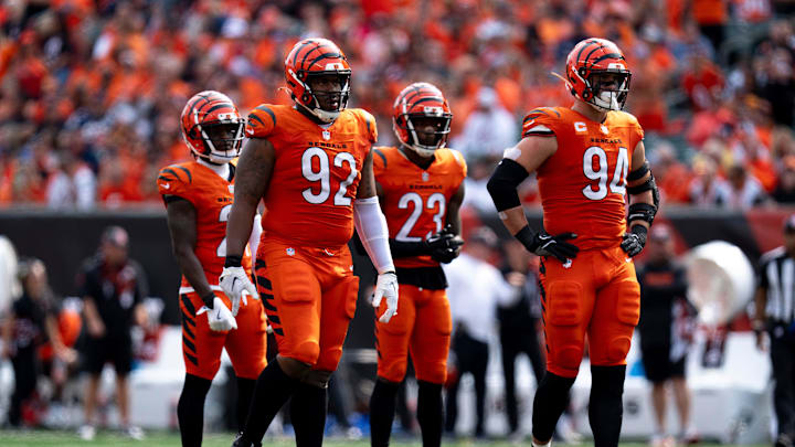 Cincinnati Bengals defensive tackle B.J. Hill (92) and Cincinnati Bengals defensive end Sam Hubbard (94) walk to the line of scrimmage in the fourth quarter of the NFL game against the New England Patriots at Paycor Stadium in Cincinnati on Sunday, Sept. 8, 2024.