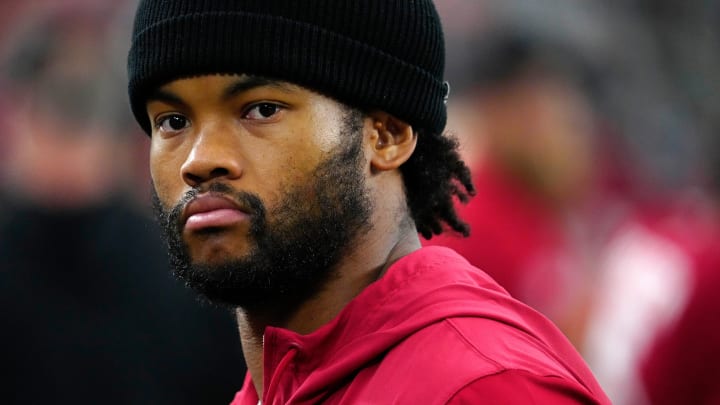 Cardinals quarterback Kyler Murray (1) on the sidelines in street clothes prior to a game against the Saints at State Farm Stadium in Glendale, Ariz., on Saturday, Aug. 10, 2024.