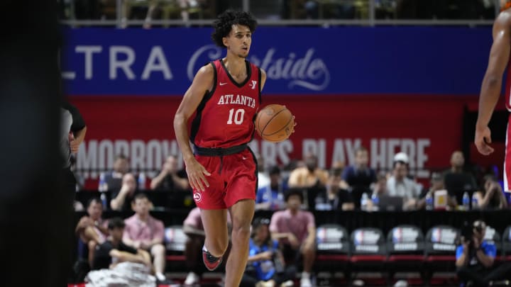 Jul 12, 2024; Las Vegas, NV, USA;  Atlanta Hawks forward Zaccharie Risacher (10) dribbles the ball against the Washington Wizards  during the first half at Thomas & Mack Center. Mandatory Credit: Lucas Peltier-USA TODAY Sports