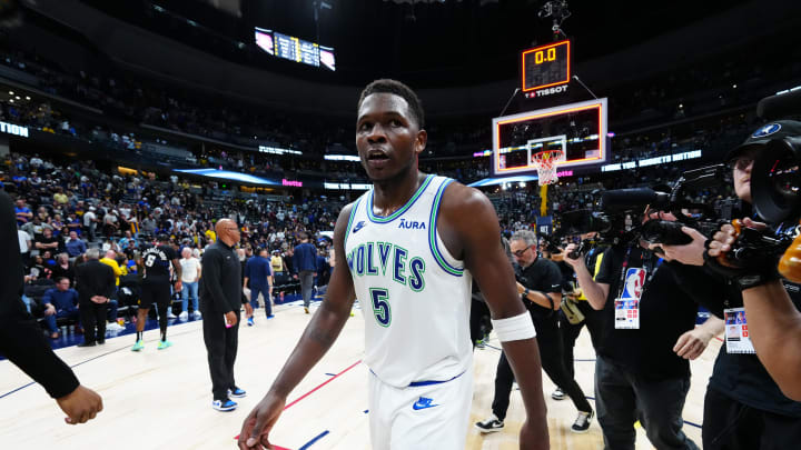 May 19, 2024; Denver, Colorado, USA; Minnesota Timberwolves guard Anthony Edwards (5) celebrates defeating the Denver Nuggets in game seven of the second round for the 2024 NBA playoffs at Ball Arena.