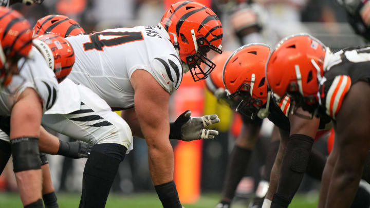 Cincinnati Bengals center Ted Karras (64) gets set to snap the ball in the second quarter of an NFL football game between the Cincinnati Bengals and Cleveland Browns, Sunday, Sept. 10, 2023, at Cleveland Browns Stadium in Cleveland.