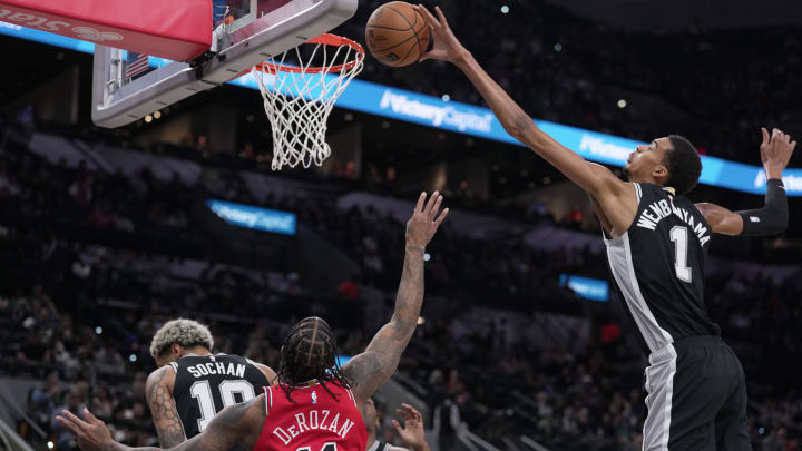 Dec 8, 2023; San Antonio, Texas, USA;  San Antonio Spurs center Victor Wembanyama (1) blocks a shot by Chicago Bulls forward DeMar DeRozan (11) in the first quarter at the Frost Bank Center.