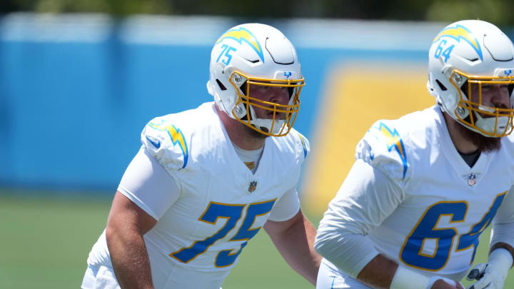 May 29, 2024; Costa Mesa, CA, USA; Los Angeles Chargers center Bradley Bozeman (75) and lineman  Brenden Jaimes (64) during organized team activities at Hoag Performance Center. Mandatory Credit: Kirby Lee-USA TODAY Sports