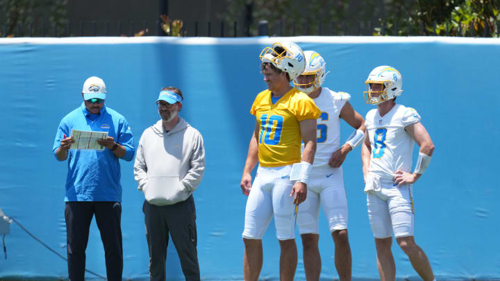 May 29, 2024; Costa Mesa, CA, USA; Los Angeles Chargers passing game coordinator Marcus Brady, quarterbacks coach Shane Day and quarterbacks Justin Herbert (10), Casey Bauman (16) and Max Duggan (8) during organized team activities at Hoag Performance Center. Mandatory Credit: Kirby Lee-USA TODAY Sports