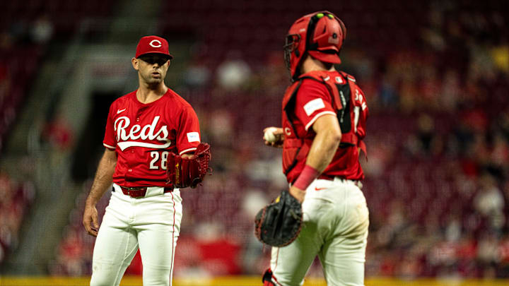 Cincinnati Reds pitcher Nick Martinez (28) receives the ball from Cincinnati Reds catcher Tyler Stephenson (37) during a timeout in the sixth inning of the MLB game between the Cincinnati Reds and Houston Astros at Great American Ball Park in Cincinnati on Wednesday, Sept. 4, 2024.