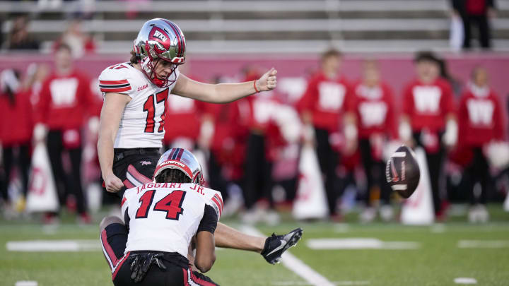 Dec 18, 2023; Charlotte, NC, USA; Western Kentucky Hilltoppers place kicker Lucas Carneiro (17) kicks the extra point during the second half against the Old Dominion Monarchs at Charlotte 49ers' Jerry Richardson Stadium. Mandatory Credit: Jim Dedmon-USA TODAY Sports