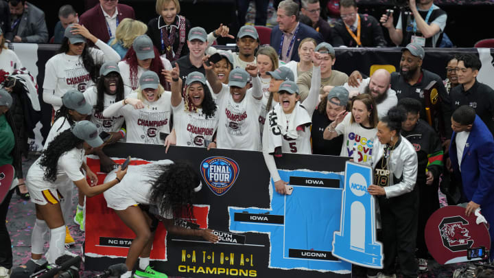 Apr 7, 2024; Cleveland, OH, USA; The South Carolina Gamecocks are presented with the trophy after defeating the Iowa Hawkeyes in the finals of the Final Four of the womens 2024 NCAA Tournament at Rocket Mortgage FieldHouse. Mandatory Credit: Aaron Doster-USA TODAY Sports