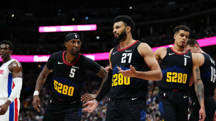 Jan 7, 2024; Denver, Colorado, USA; Denver Nuggets guard Jamal Murray (27) and guard Kentavious Caldwell-Pope (5) and forward Michael Porter Jr. (1) in the first quarter against the Detroit Pistons at Ball Arena. Mandatory Credit: Ron Chenoy-USA TODAY Sports