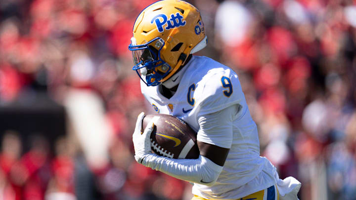 Pittsburgh Panthers wide receiver Konata Mumpfield (9) scores a touchdown in the fourth quarter of the College Football game at Nippert Stadium in Cincinnati on Saturday, Sept. 7, 2024.