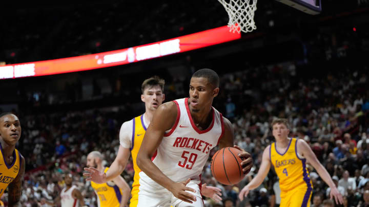 Jul 12, 2024; Las Vegas, NV, USA; Houston Rockets center Orlando Robinson (59) controls the ball against the Los Angeles Lakers during the first half at Thomas & Mack Center. Mandatory Credit: Lucas Peltier-USA TODAY Sports