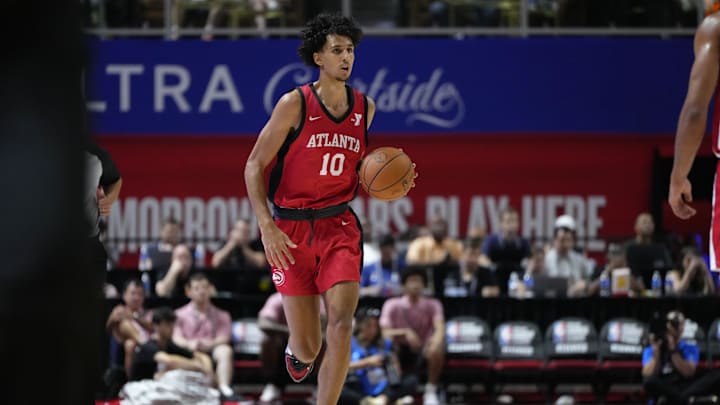 Jul 12, 2024; Las Vegas, NV, USA;  Atlanta Hawks forward Zaccharie Risacher (10) dribbles the ball against the Washington Wizards  during the first half at Thomas & Mack Center. Mandatory Credit: Lucas Peltier-Imagn Images