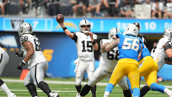 Sep 8, 2024; Inglewood, California, USA; Las Vegas Raiders quarterback Gardner Minshew (15) throws the ball against the Los Angeles Chargers in the first half at SoFi Stadium. Mandatory Credit: Kirby Lee-Imagn Images