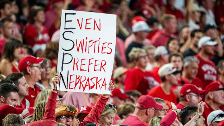 A Nebraska Cornhuskers fan holds a Taylor Swift themed sign during a game against the Cincinnati Bearcats at Arrowhead Stadium. 