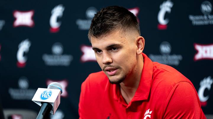 Cincinnati Bearcats guard Kerr Kriisa speaks at a podium at First Third Arena in Cincinnati on Wednesday, July 16, 2025.