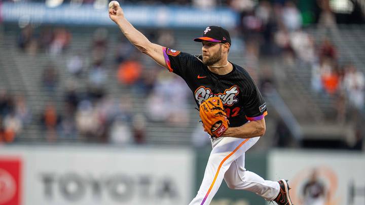 Aug 25, 2026; San Francisco, California, USA;  San Francisco Giants starting pitcher Adrian Houser (12) delivers a pitch during the first inning against the Cincinnati Reds at Oracle Park.  Mandatory Credit: Neville E. Guard-Imagn Images
