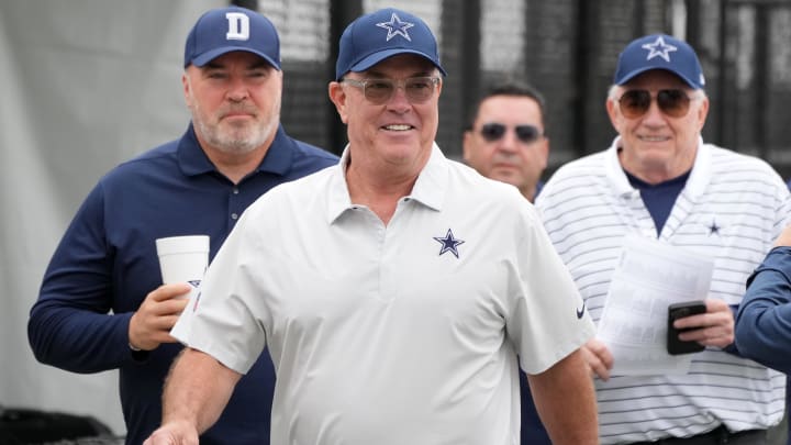 Jul 26, 2022; Oxnard, CA, USA; Dallas Cowboys chief operating officer Stephen Jones (center) arrives with coach Mike McCarthy (left) and owner Jerry Jones at training camp press conference at the River Ridge Fields.  