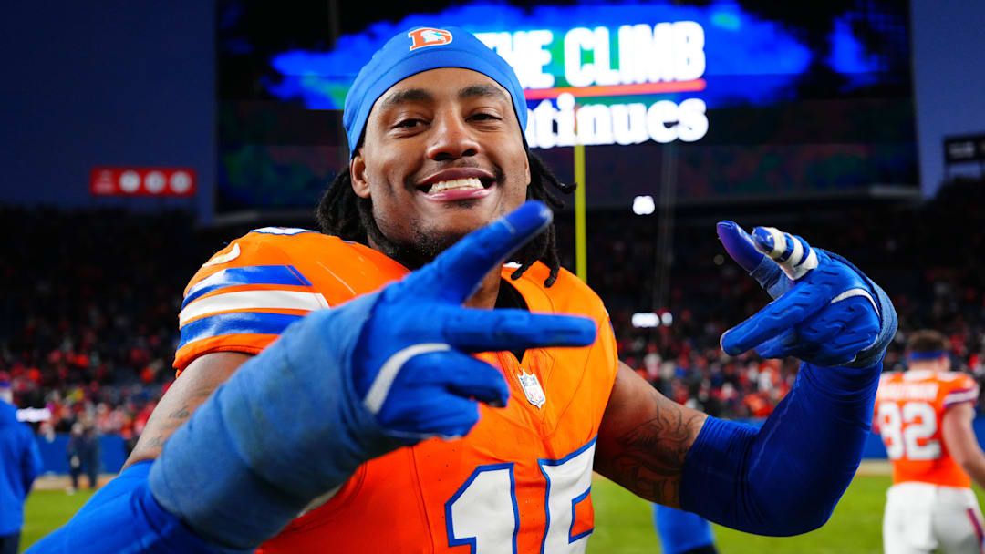 Jan 5, 2025; Denver, Colorado, USA; Denver Broncos linebacker Nik Bonitto (15) following the win against the Kansas City Chiefs at Empower Field at Mile High. Mandatory Credit: Ron Chenoy-Imagn Images