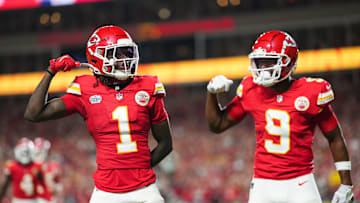 Sep 5, 2024; Kansas City, Missouri, USA; Kansas City Chiefs wide receiver Xavier Worthy (1) celebrates with wide receiver JuJu Smith-Schuster (9) after scoring a touchdown during the second half against the Baltimore Ravens at GEHA Field at Arrowhead Stadium. Mandatory Credit: Jay Biggerstaff-Imagn Images