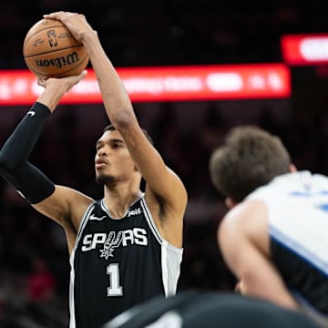 Jan 31, 2024; San Antonio, Texas, USA; San Antonio Spurs center Victor Wembanyama (1) shoots a free throw in the first half against the Orlando Magic at Frost Bank Center.