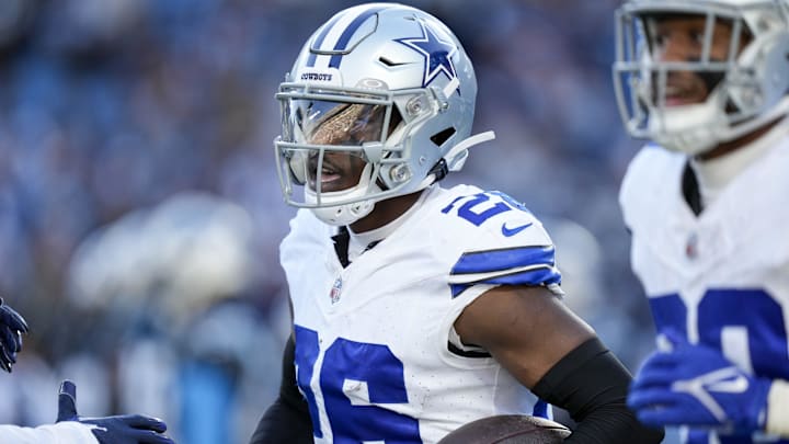 Nov 19, 2023; Charlotte, North Carolina, USA;   Dallas Cowboys cornerback DaRon Bland (26) celebrates his score against the Carolina Panthers during the second half at Bank of America Stadium. 