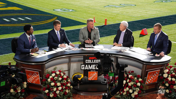 Jan 1, 2024; Pasadena, CA, USA; From left: Desmond Howard, Rece Davis, Pat McAfee, Lee Corso and Kirk Herbstreit on the ESPN College Gameday set at the 2024 Rose Bowl college football playoff semifinal game at Rose Bowl. Mandatory Credit: Kirby Lee-USA TODAY Sports