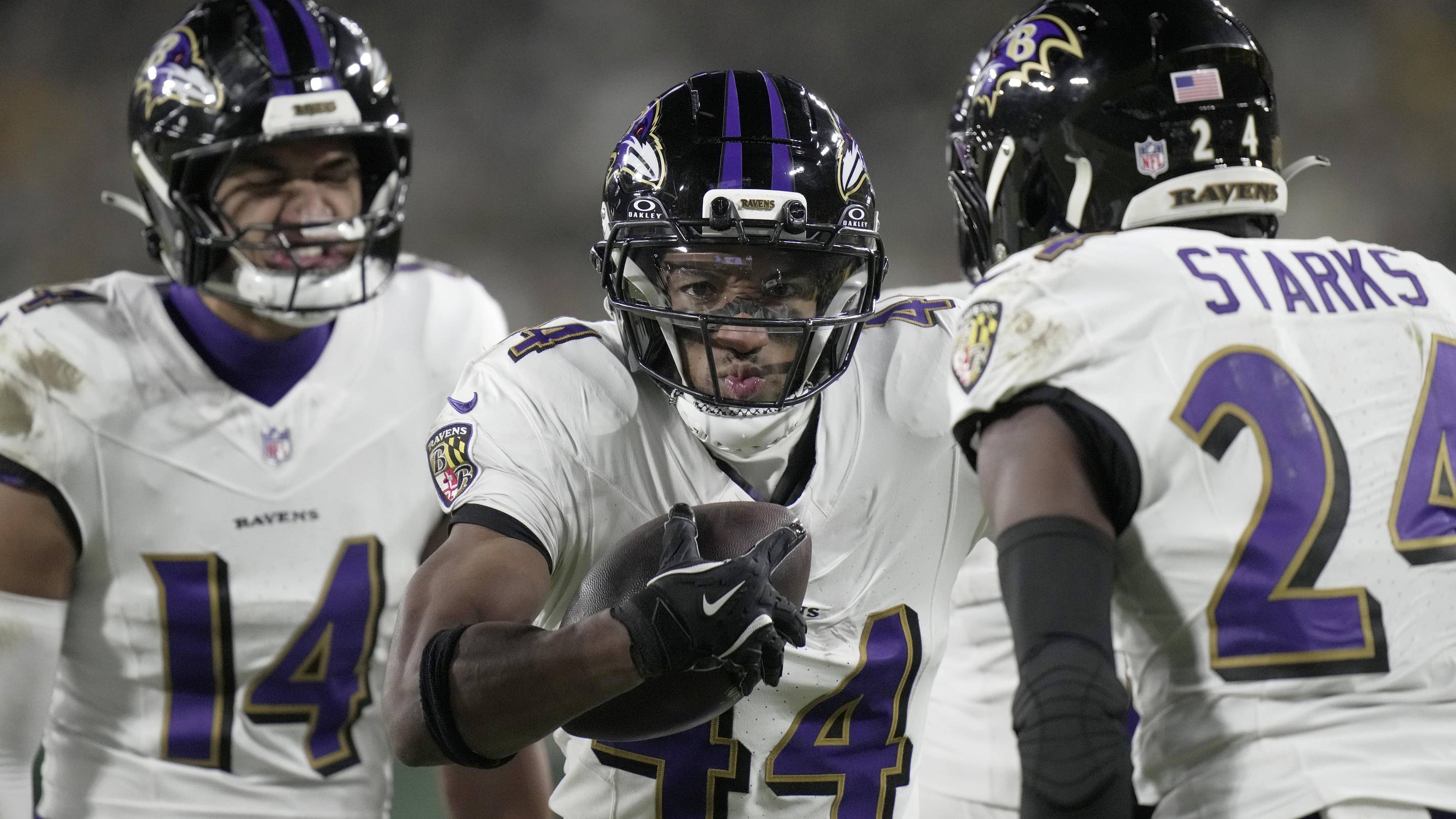 Dec 27, 2025; Green Bay, Wisconsin, USA; Baltimore Ravens cornerback Marlon Humphrey (44) celebrates his interception during the fourth quarter at Lambeau Field. Mandatory Credit: Mark Hoffman/Milwaukee Journal Sentinel via Imagn Images