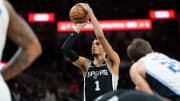 Jan 31, 2024; San Antonio, Texas, USA; San Antonio Spurs center Victor Wembanyama (1) shoots a free throw in the first half against the Orlando Magic at Frost Bank Center. 