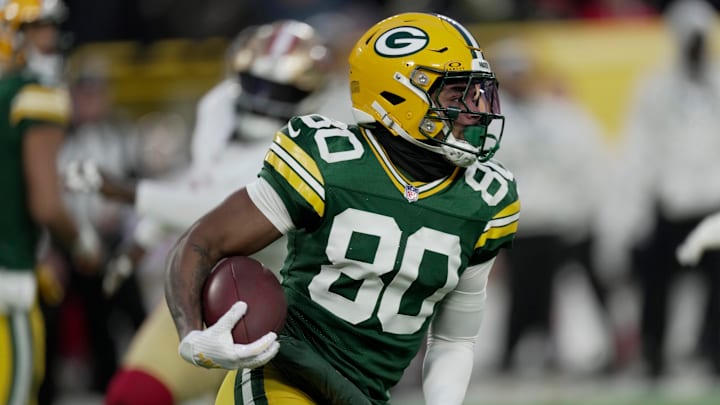 Green Bay Packers wide receiver Bo Melton (80) runs for the five yards during the second quarter of their game against the San Francisco 49ers Sunday, November 24, 2024 at Lambeau Field in Green Bay, Wisconsin. Green Bay Packers wide receiver Bo Melton (80) runs for the five yards during the second quarter of their game against the San Francisco 49ers Sunday, November 24, 2024 at Lambeau Field in Green Bay, Wisconsin.